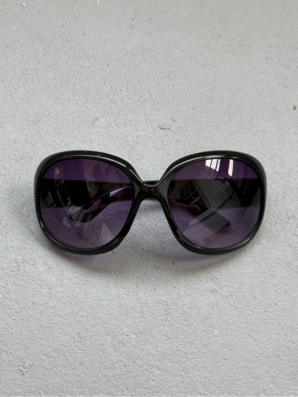 Women’s Black Frame Sunglasses with Purple Lenses